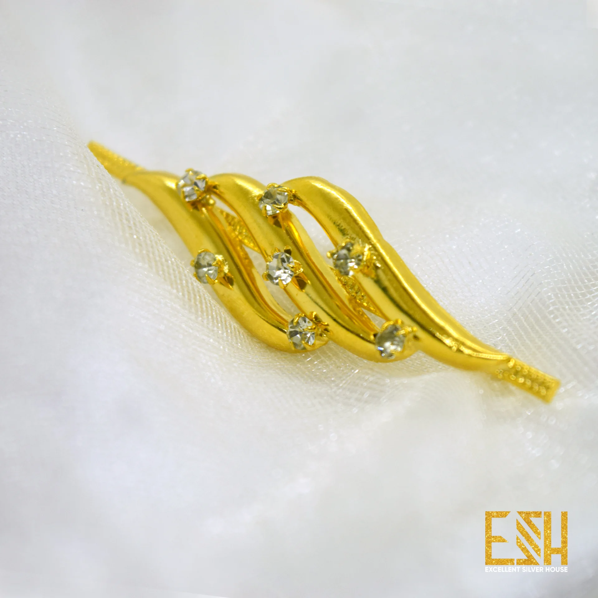 Gold plated Saree Brooch with White stone