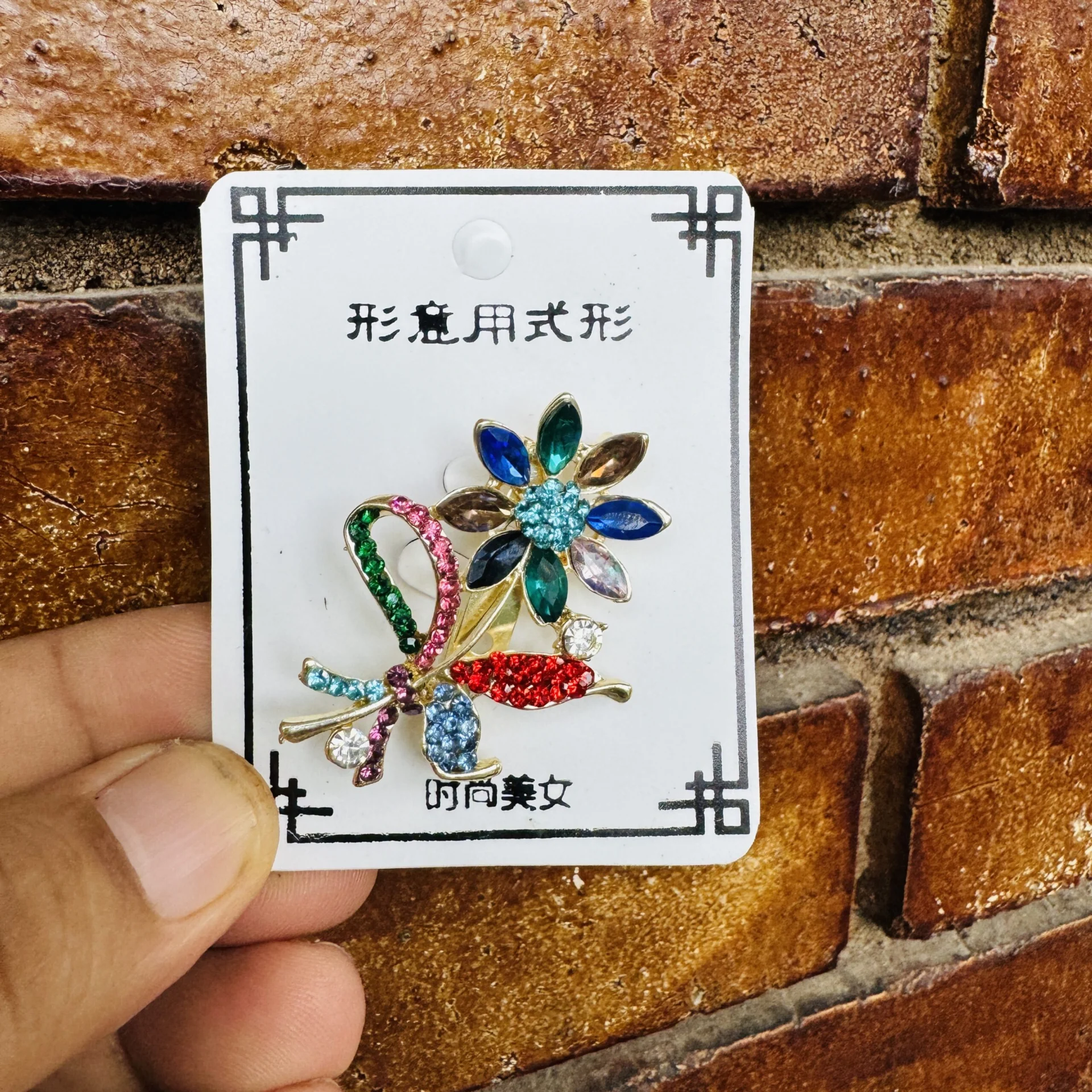 Light gold color very beautiful sunflower design saree brooch with dark and light multi color stone for women