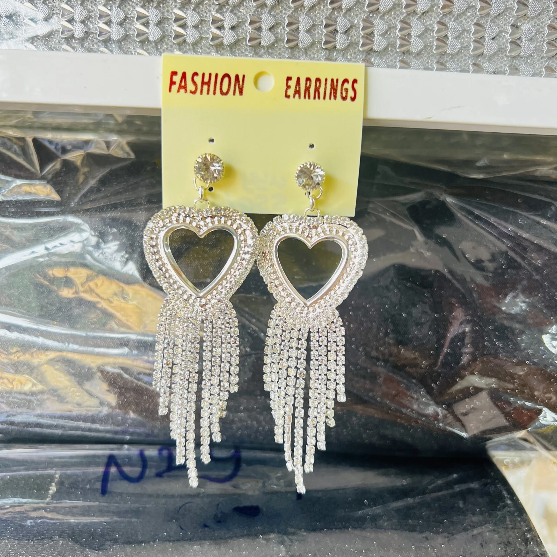 Silver color long tassel heart type beautiful drop earring with white fixed stone for women and girl