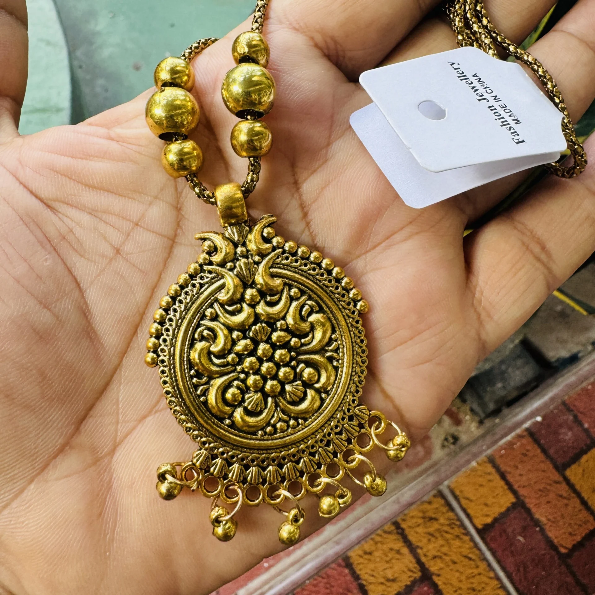 Oxidize Gold color 22-inch short chain with round design medium pendant without stone and gold beaded necklace for women and girl