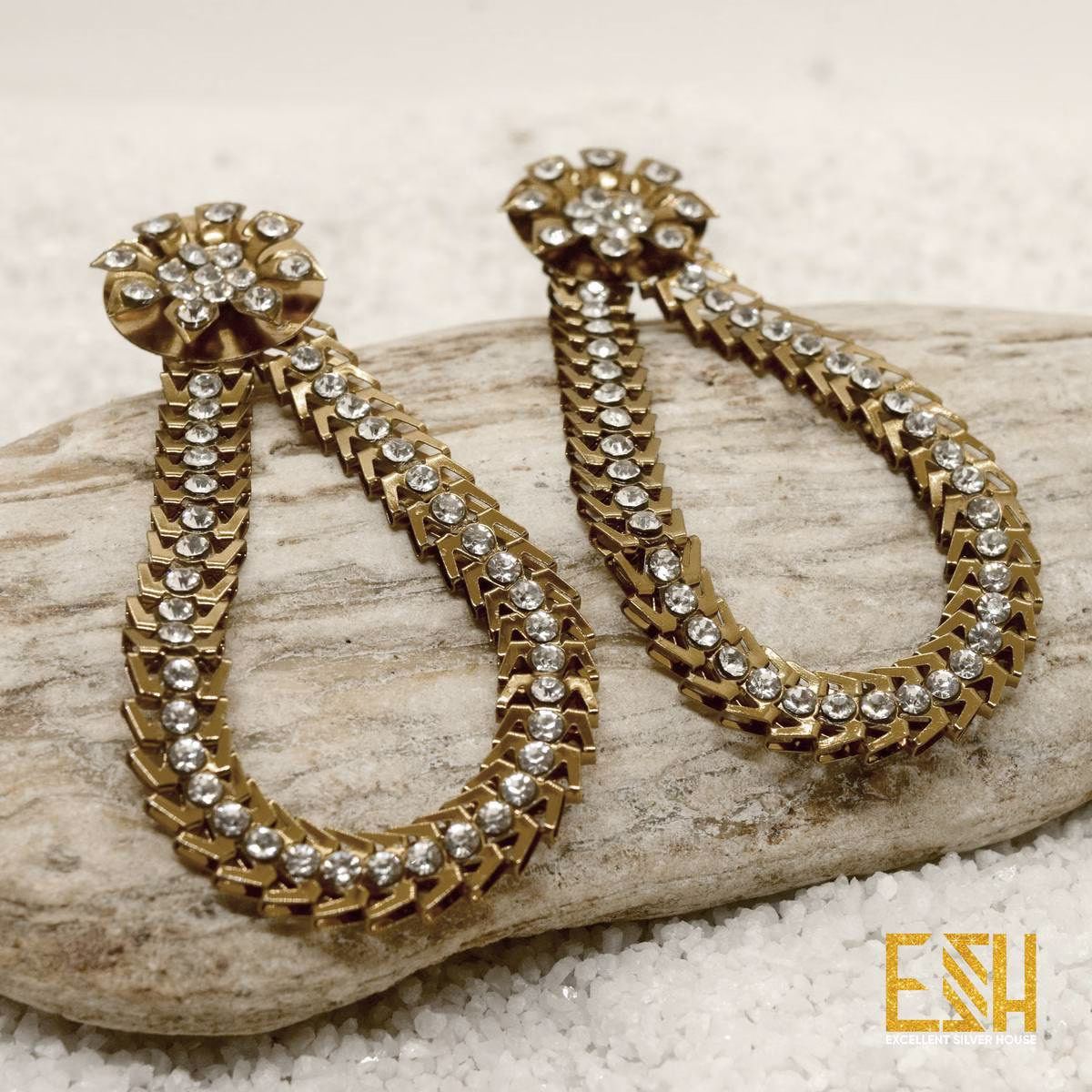 Weightless Dull Gold Earrings With White Stone