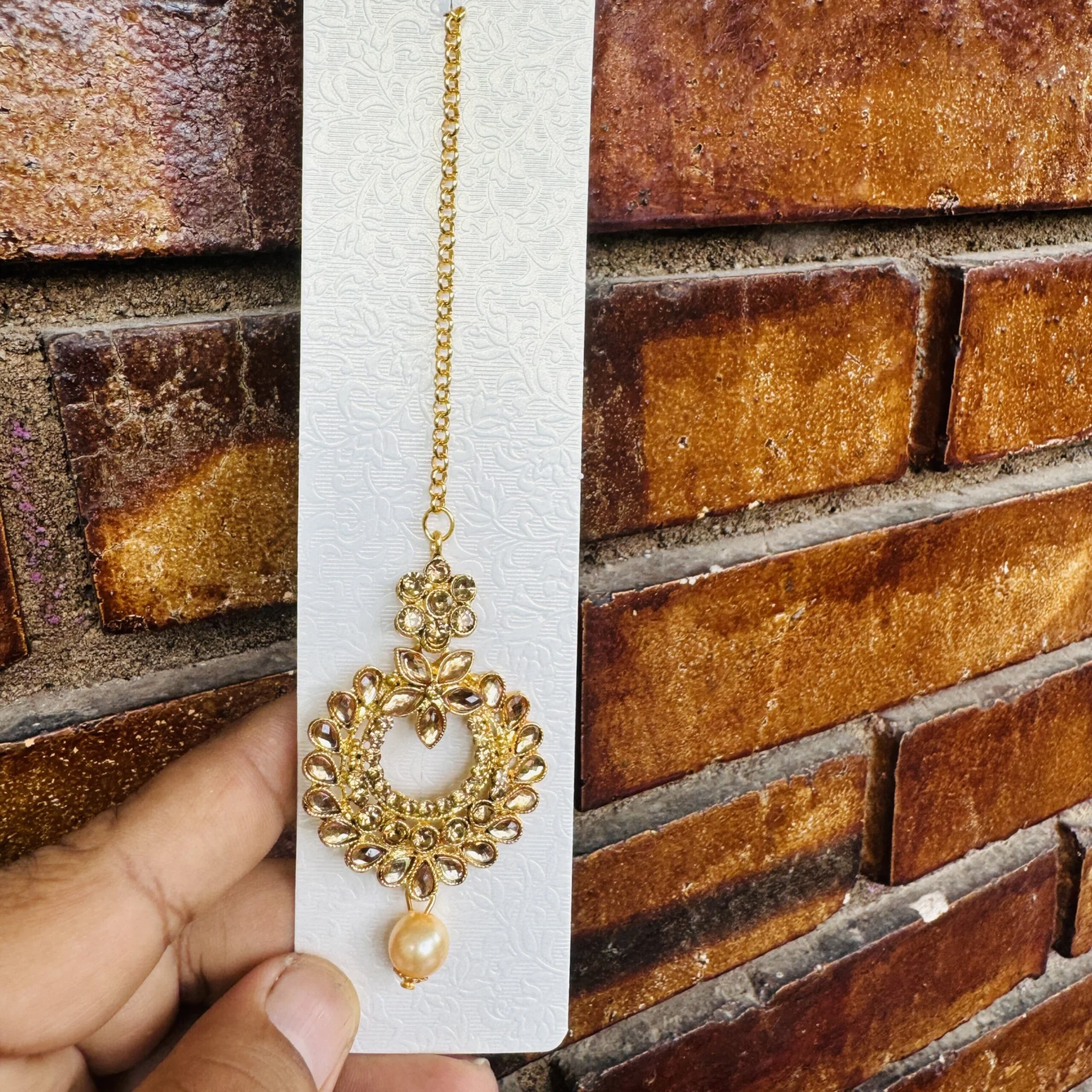 Dull gold color leaf type beautiful nalal theli with gold stone and pearl beaded hair ornament for women and girl gift item for women