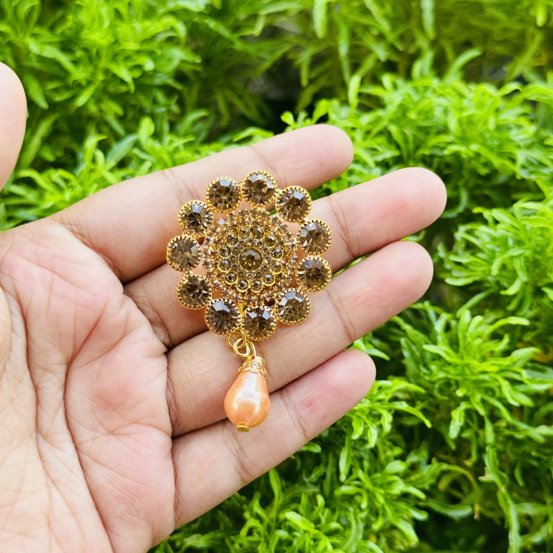 Dull gold Latest design with charm Stylish Look gold color round stone rose flower and gold stone Saree Brooch It makes the perfect gift for your loved ones Latest design with charm.