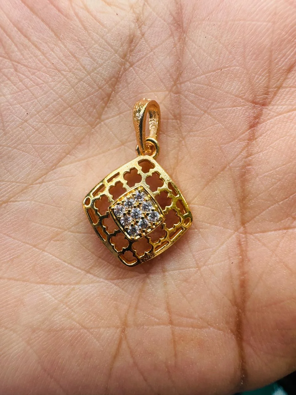 Gold plated new stylish rich look net design square pendent with white stones for women and Girl