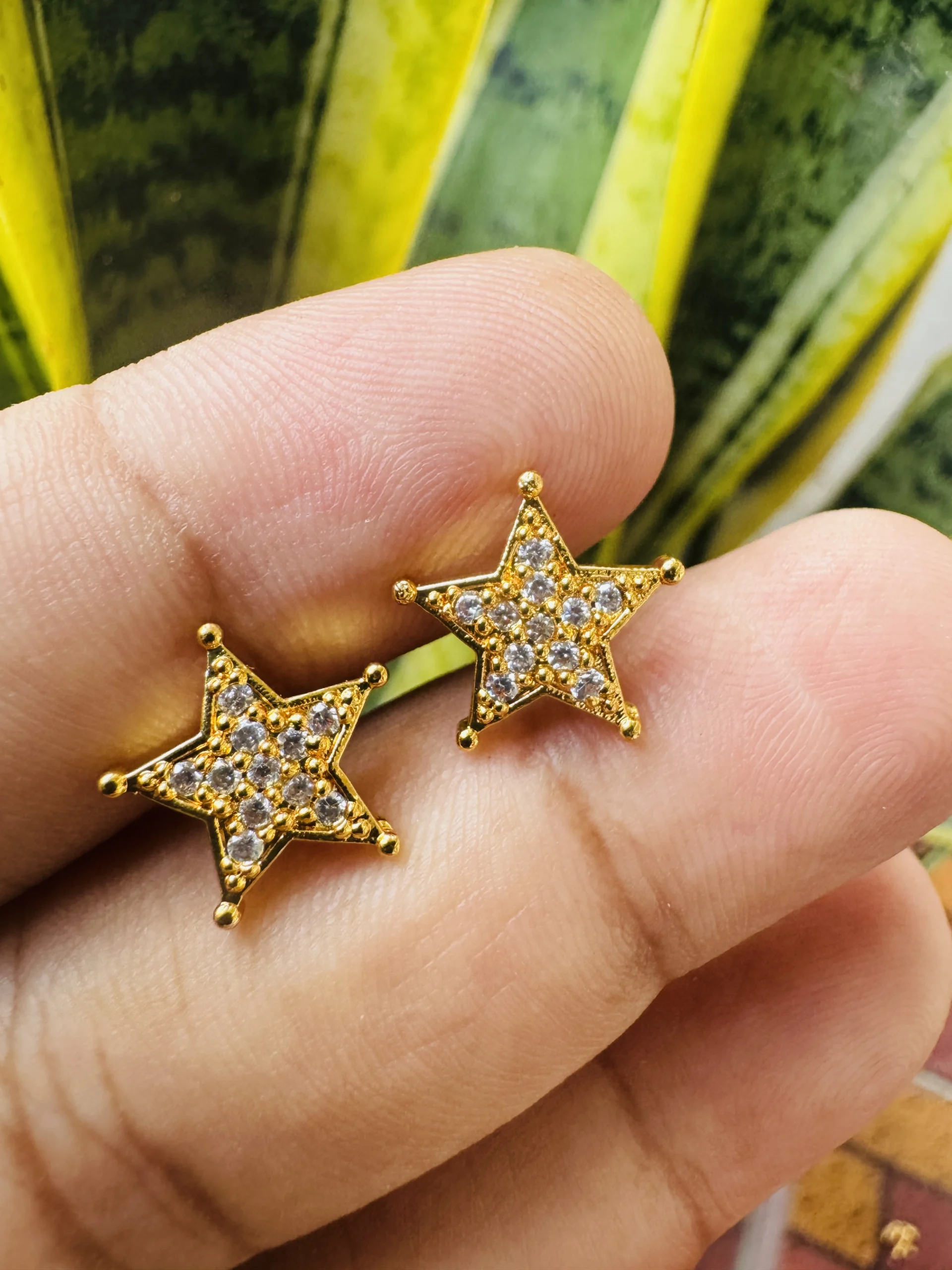 Gold plated new stylish cute star stud earring with white stones for women's and girls